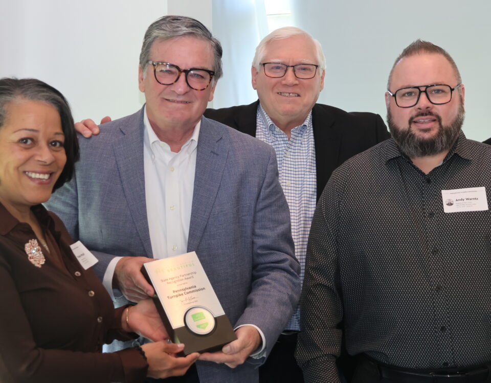With the Keep America Beautiful 2025 State Agency Partnership Award are Phoebe Wetzel, KPB Board Chair, TPC Commissioner Chair Michael Carroll, Commissioner Doug Farnham, Andy Warntz, KPB Vice Chair