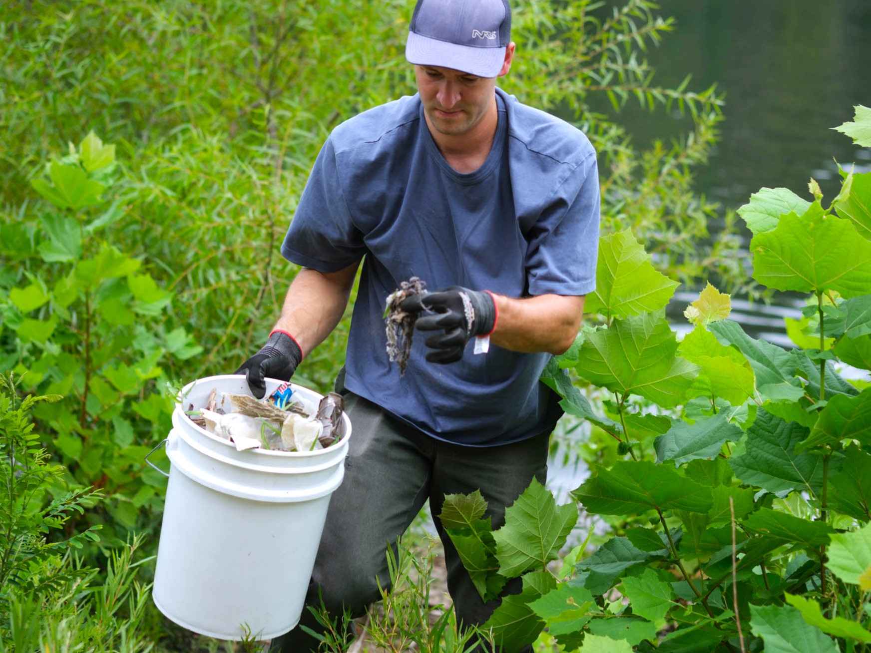Allegheny CleanWays volunteer cleaning up along the Ohio River in 2025.