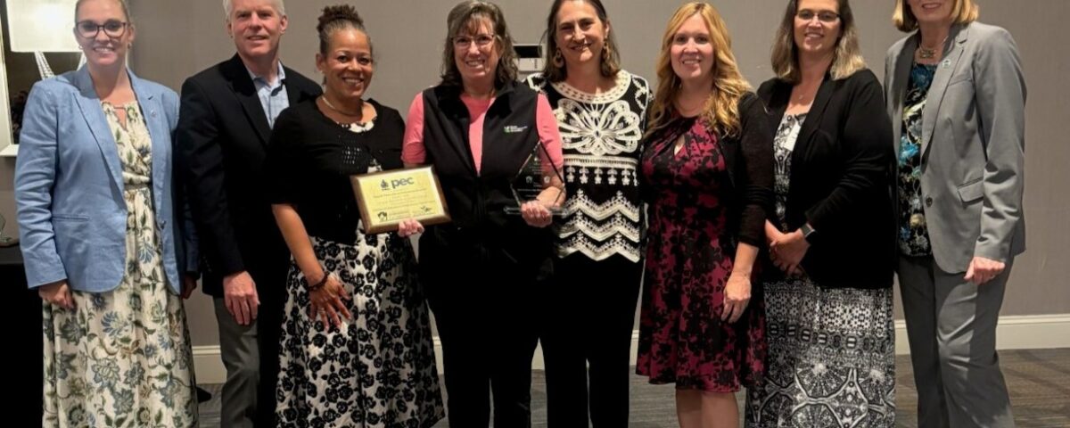 Michelle Dunn, the 2026 Pennsylvania Governors Lifetime Achievement Award recipient, poses with Keep PA Beautiful staff and board, state agency leaders and other non-profit partners.
