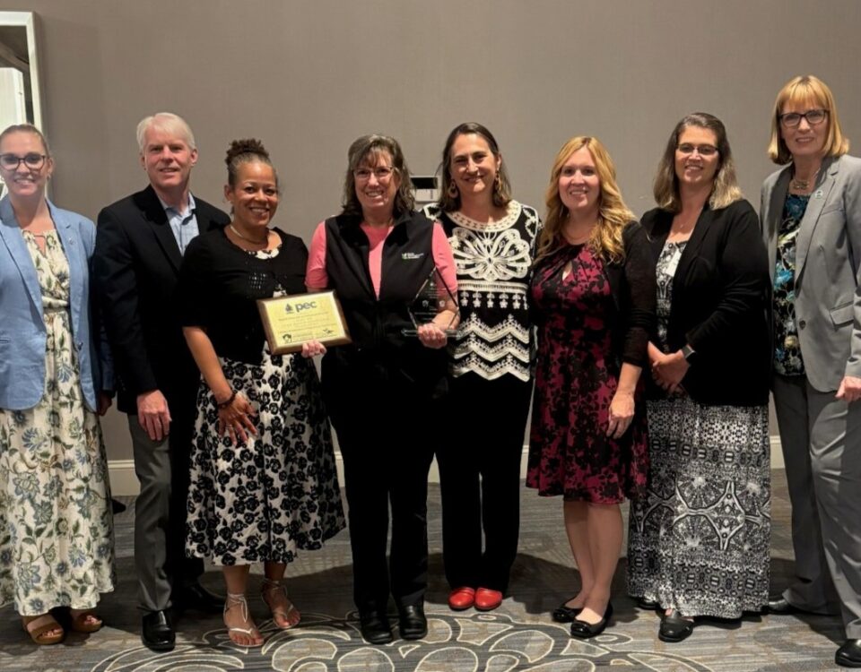 Michelle Dunn, the 2026 Pennsylvania Governors Lifetime Achievement Award recipient, poses with Keep PA Beautiful staff and board, state agency leaders and other non-profit partners.