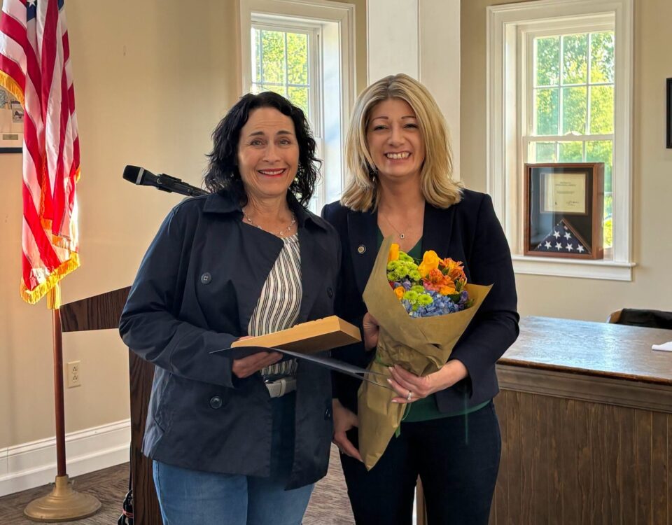 Beth Intoccia, of Litter Lifters of West Vincent, accepts the Community Pride Award from Senator Muth.