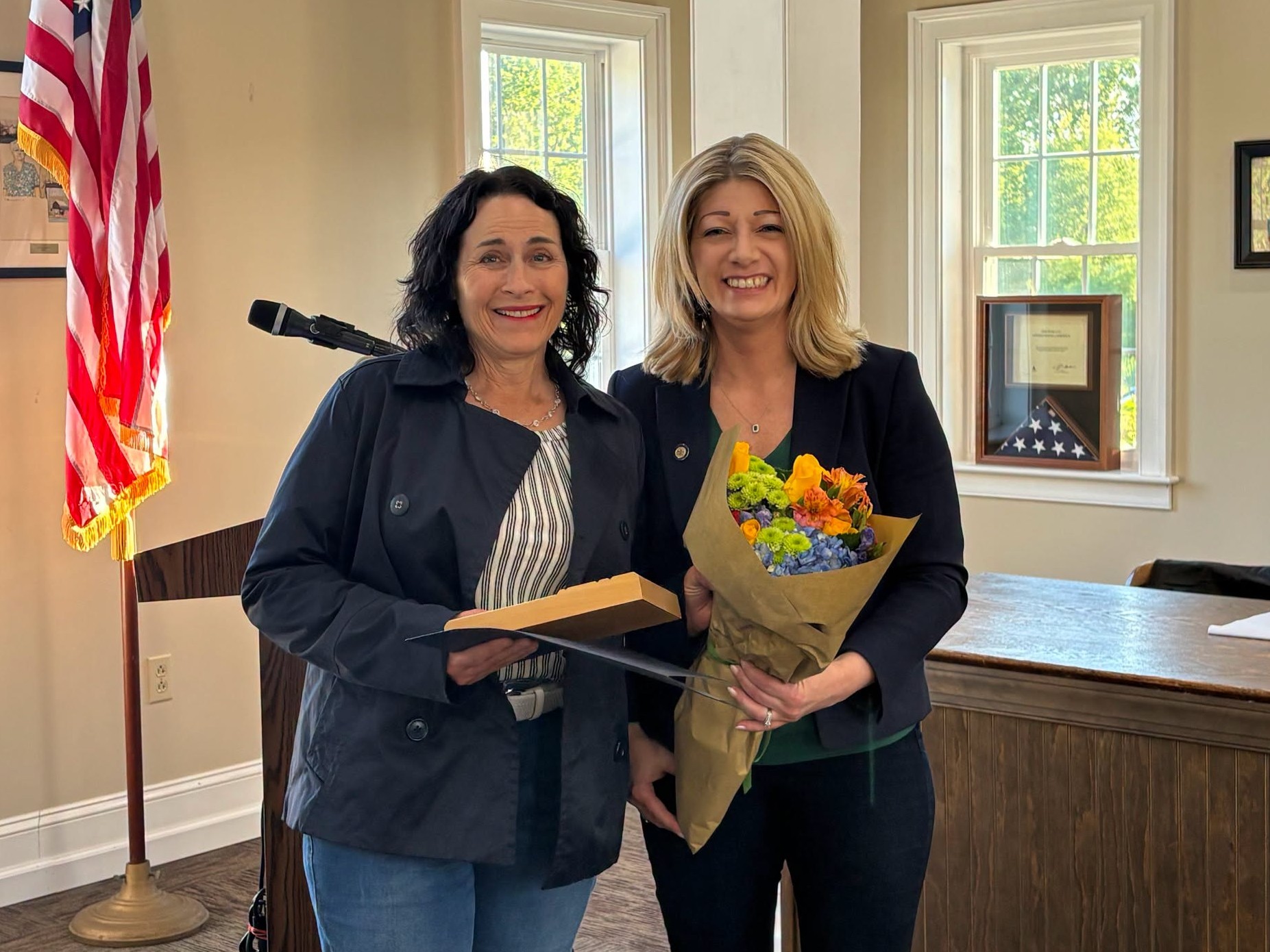 Beth Intoccia, of Litter Lifters of West Vincent, accepts the Community Pride Award from Senator Muth.